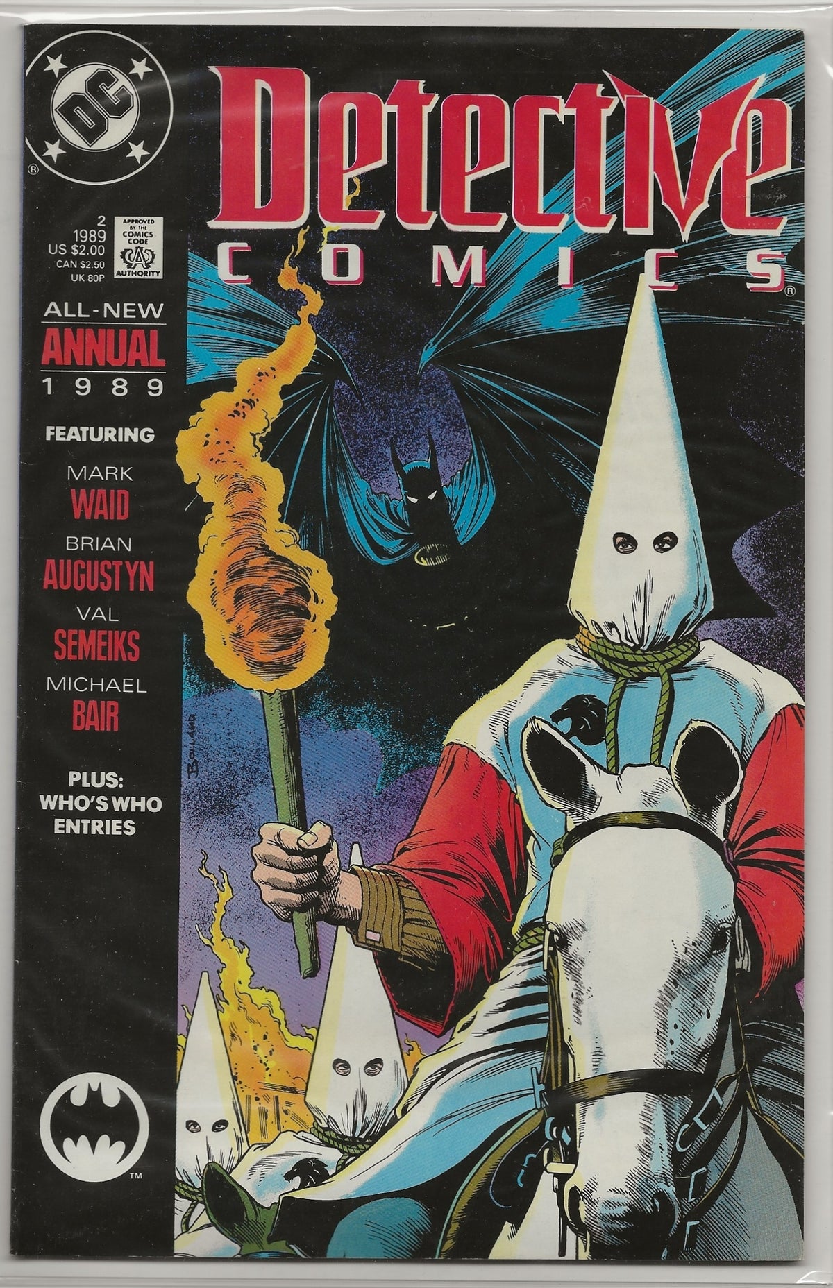 A comic book titled 'Detective Comics Annual 1989' featuring Batman imagery and illustrated figures in white pointed hoods on a horse, with the DC logo in the top left corner.