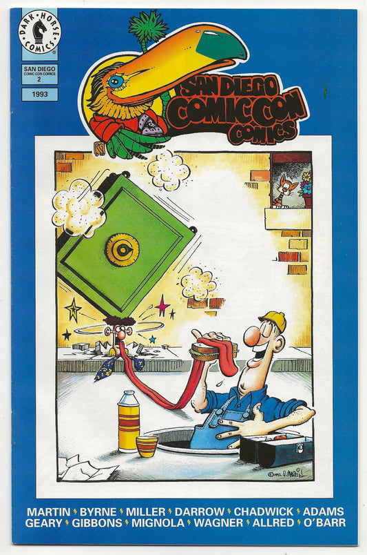 Comic book cover featuring a cartoon character with a green box and colorful background, San Diego Comic-Con 2002 edition.
