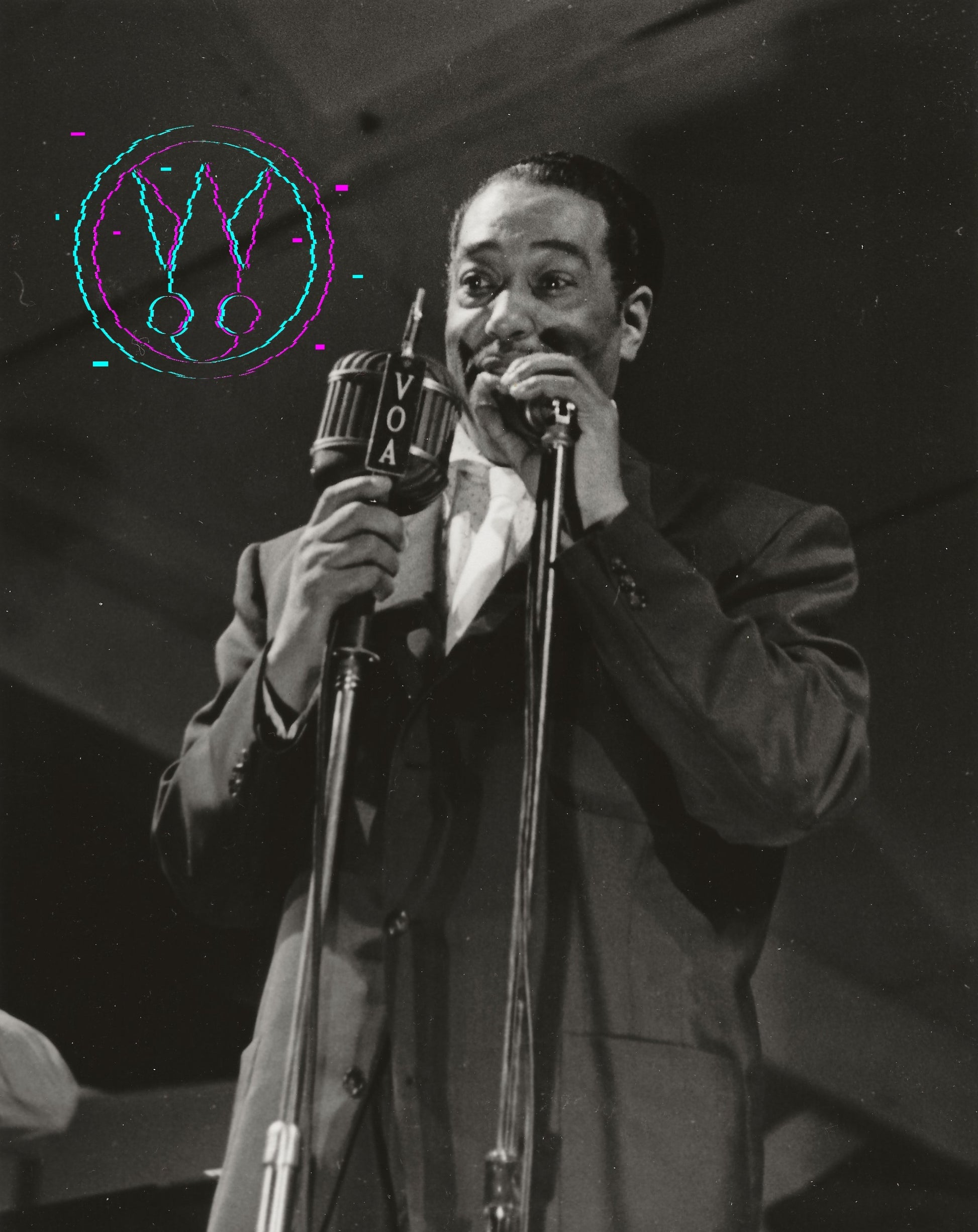 Black and white photograph of a man singing into a vintage microphone on stage, wearing a suit and tie. A colorful abstract graphic overlay is visible in the upper left corner.